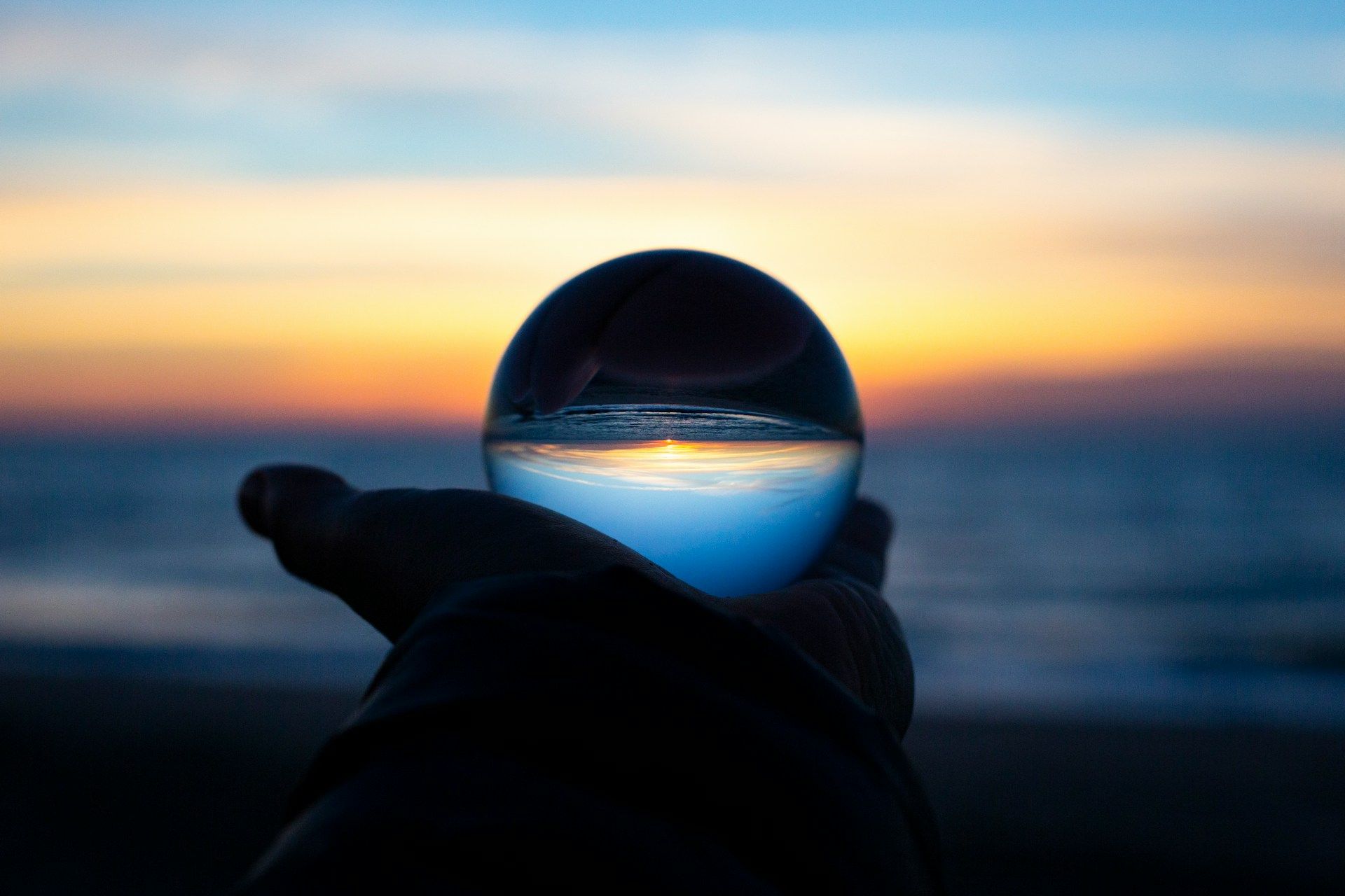 person holding a clear glass